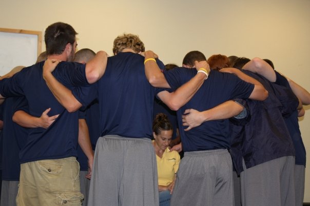 AIA Fellas praying over Natalie (Jonny Mac's wife) after she shares her 3 H's (hero, hardship & highlight) and gives the guys a womans perspective on relationshsips